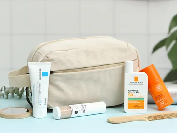 Bolsa tipo neceser Huambo de material Ripstop resistente en colores azul marino beige gris y lila para regalos corporativos de viaje. Usos.