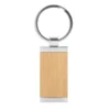 Llavero de bambú TAG rectangular con detalles metálicos y estuche de regalo individual para fidelización corporativa.