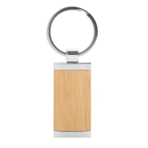 Llavero de bambú TAG rectangular con detalles metálicos y estuche de regalo individual para fidelización corporativa.