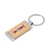 Llavero de bambú TAG rectangular con detalles metálicos y estuche de regalo individual para fidelización corporativa.