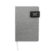 Libreta TIK de diseño ejecutivo en RPET gris con cierre magnético de neodimio y tira de poliuretano.