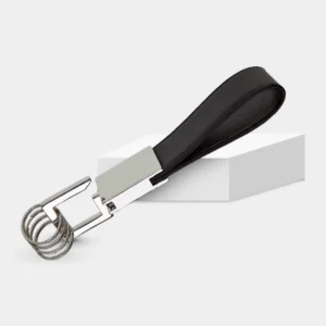 Llavero Arum de curpiel y metal con 4 argollas y estuche de regalo para eventos empresariales.