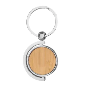 Llavero de bambú SPIN circular con estructura giratoria 360 grados, detalles metálicos y estuche de regalo.
