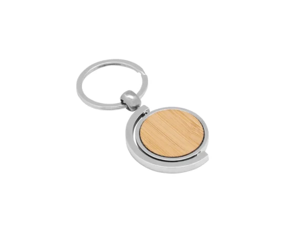 Llavero de bambú SPIN circular con estructura giratoria 360 grados, detalles metálicos y estuche de regalo.