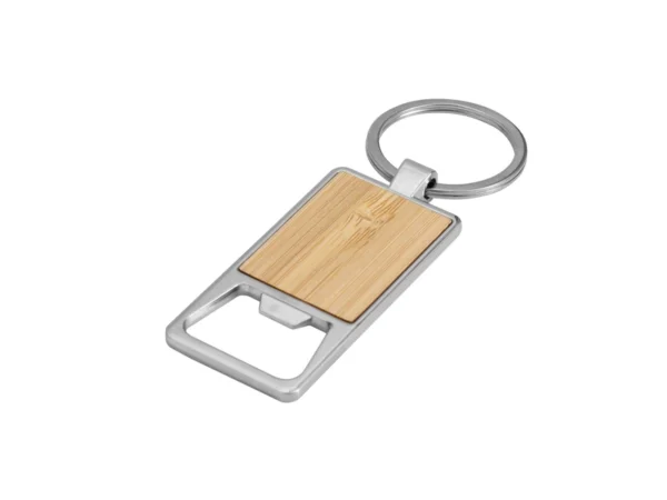 Llavero destapador KIDRINK con estructura metálica brillante, panel de bambú barnizado y estuche de regalo con terciopelo.