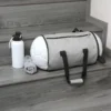 Maleta Murkle. Mochila expandible de poliéster con diseño de pelota de fútbol y asas superiores