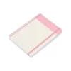 Libreta Emba abierta mostrando hojas rayadas, cubierta de papel artístico y banda elástica de cierre — vista 01